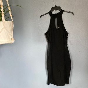 🎉🆕 CHARLOTTE RUSSE sexy black dress with sheer peek a boo sides. Size med.